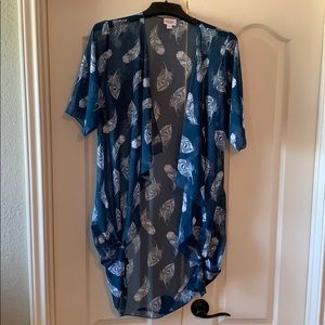 LuLaRoe Blue Shirley with white feathers.